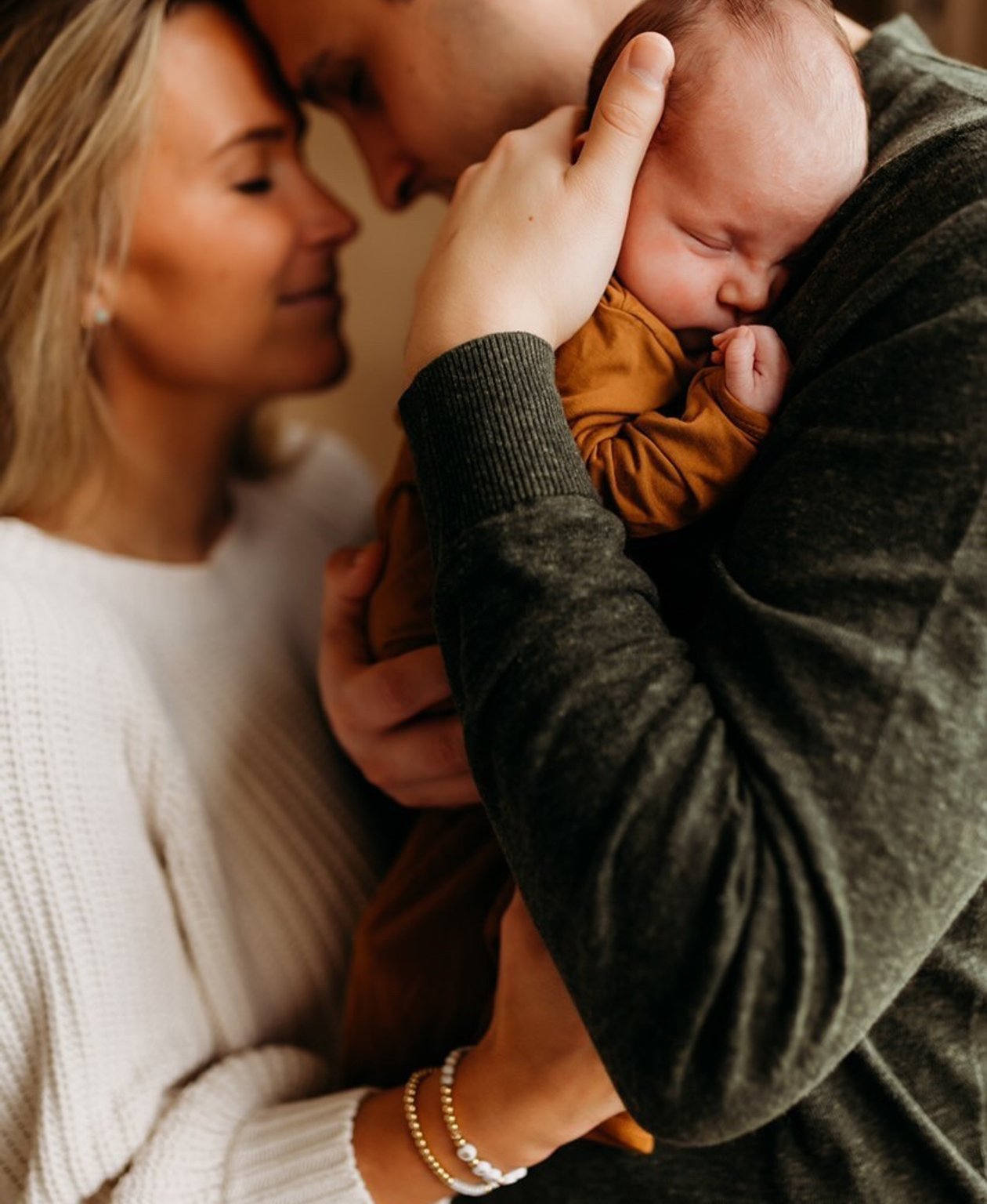 Family holding bay
