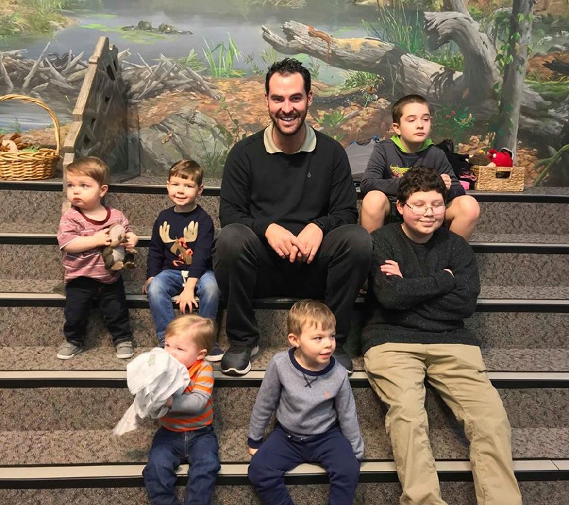 Ryan with a bunch of kids