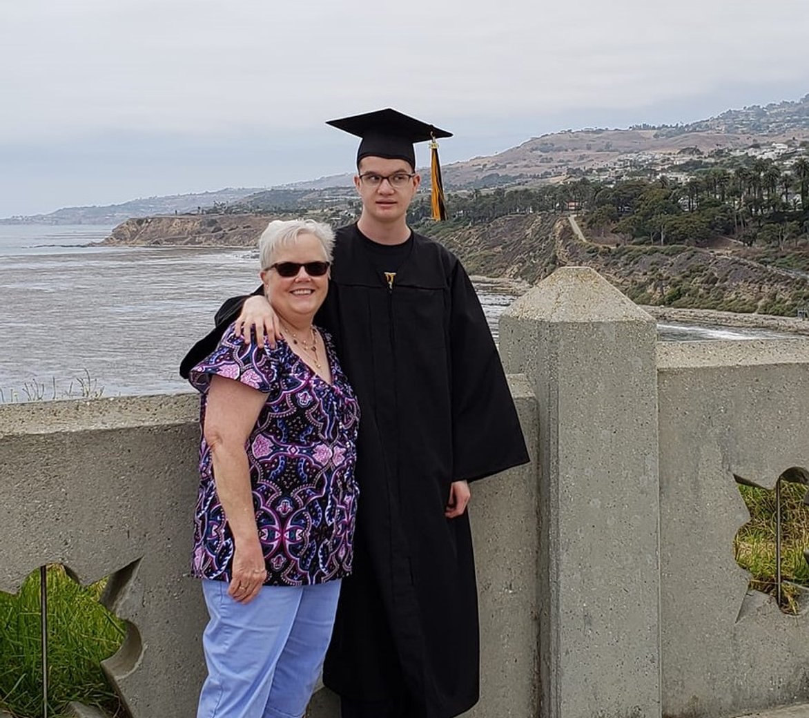 Mother with graduated son